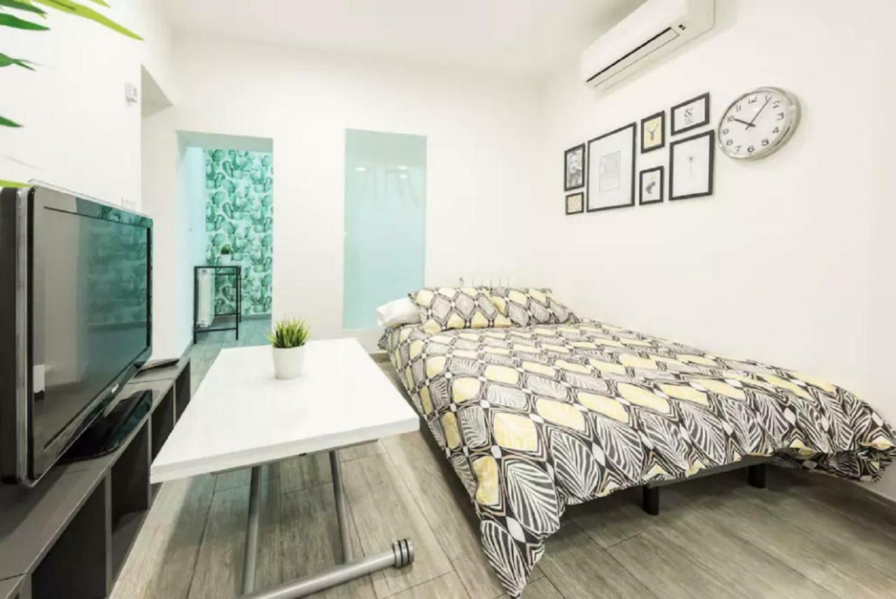 Apartamento Tirso De Molina Madrid Bagian luar foto